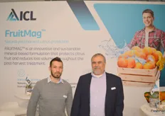 ICL Alexander Frenklach and Itzik Malul showing the FruitMag natural post-harvest citrus protection.